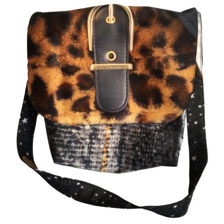 Leopard print upcycled billboard messanger hand bag made from waste by communities