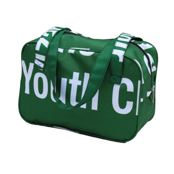 side view of a green and white upcycle billboard banner hand bag