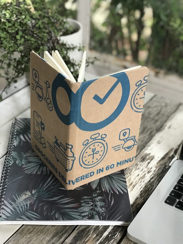Recycled notebooks covered in paper