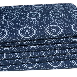 stack of traditional blue and white shwe shwe covered books