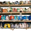 Image of a shelf full of mini utility keyring purses