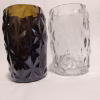 glass bottles hand cut and turned into vases