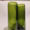 two wine bottles cut and made into vases