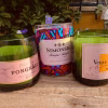 three champagne bottles turned into pot candles