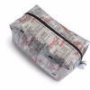 coke bottle wrappers recycled into a utility bag